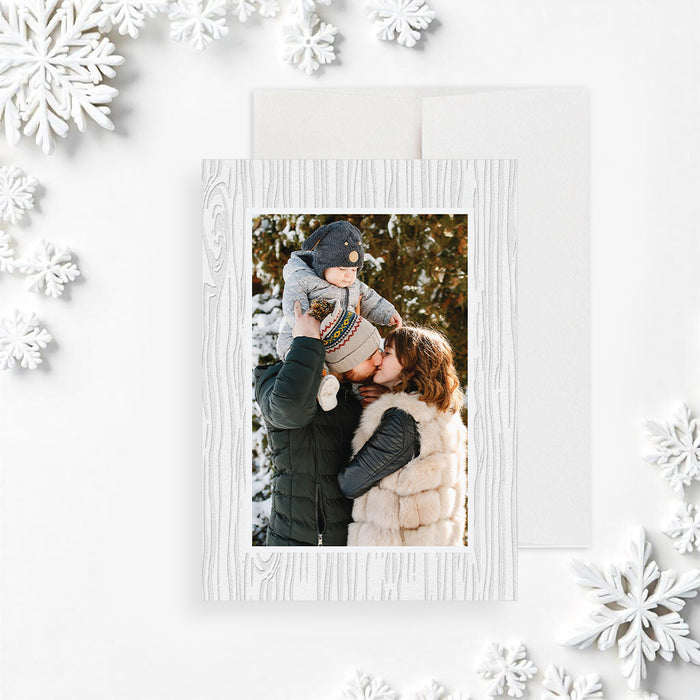 Digital holiday greeting card featuring a winter family photo framed in a white textured border, perfect for Christmas and seasonal messages.