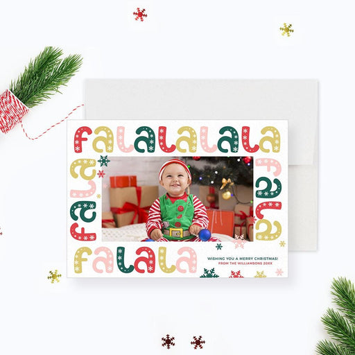 a christmas card with a picture of a baby