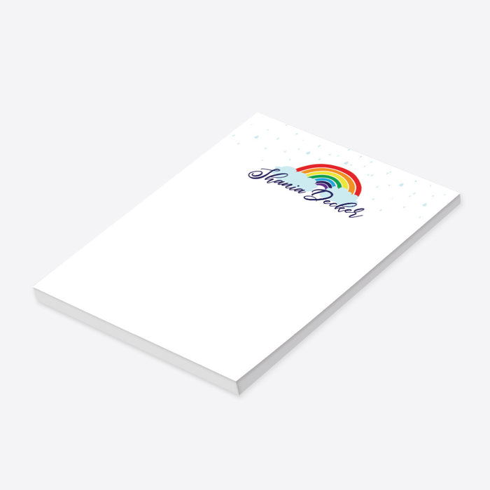 Personalized kids notepad with rainbow and cloud design on clean white background for fun children stationery and writing pad gift-side