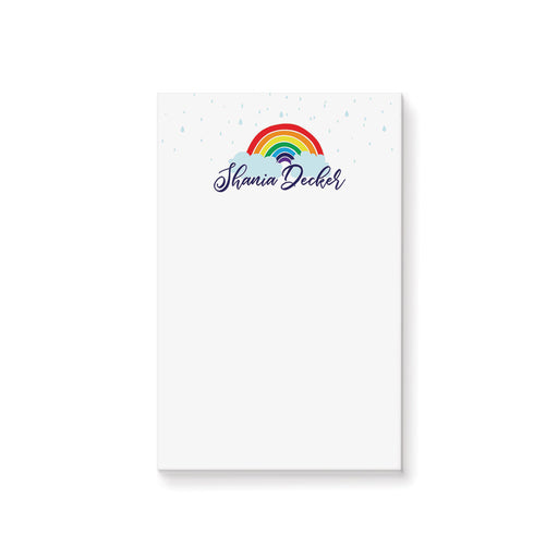 Personalized kids notepad with rainbow and cloud design on clean white background for fun children stationery and writing pad gift