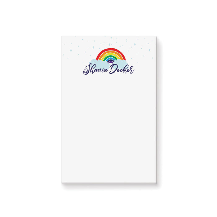 Personalized kids notepad with rainbow and cloud design on clean white background for fun children stationery and writing pad gift