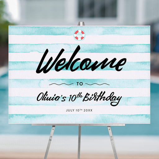 kids pool party welcome sign with watercolor aqua stripes, lifebuoy accent, and birthday details displayed on an easel