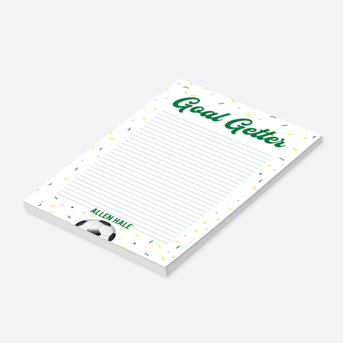Personalized goal-getter kids' notepad with green lettering, confetti, and soccer ball design-side