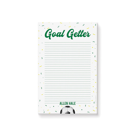 Personalized goal-getter kids' notepad with green lettering, confetti, and soccer ball design
