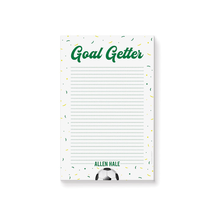 Personalized goal-getter kids' notepad with green lettering, confetti, and soccer ball design