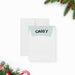 Personalized kids note card with snowy winter scene, snowflakes, pine trees, and custom name in snow lettering-front