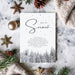 minimal winter holiday invitation featuring let it snow script black text scattered snow dots and snowy pine trees at bottom