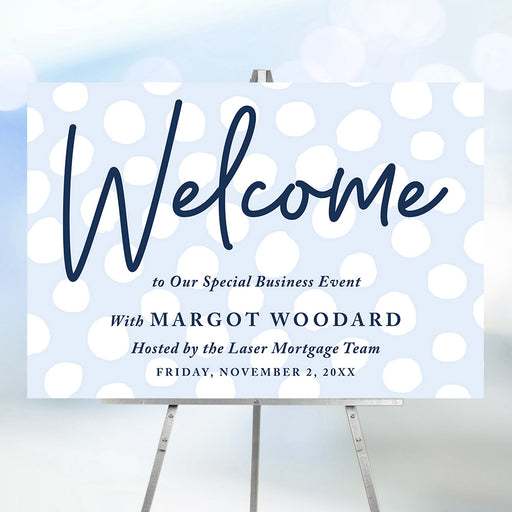 corporate special event welcome sign with light blue dot design, navy lettering, and custom business event details displayed on an easel