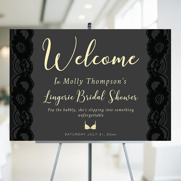 Personalized bridal shower welcome sign featuring black lace design and elegant lettering, displayed on an easel.