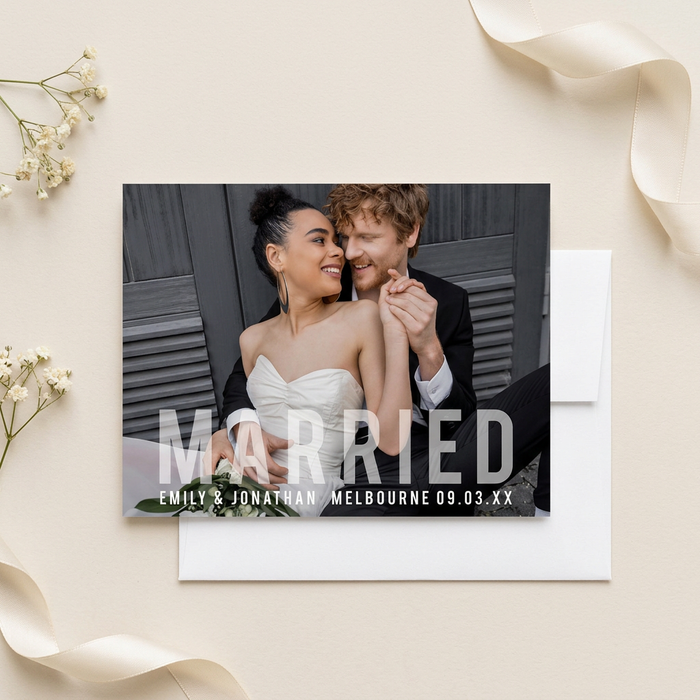 Married photo announcement flat lay