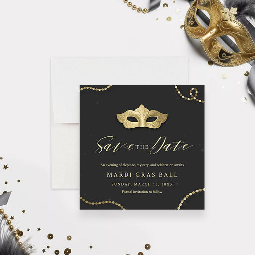 black and gold masquerade save the date card with mask illustration, bead accents, elegant lettering, and custom Mardi Gras ball details-front