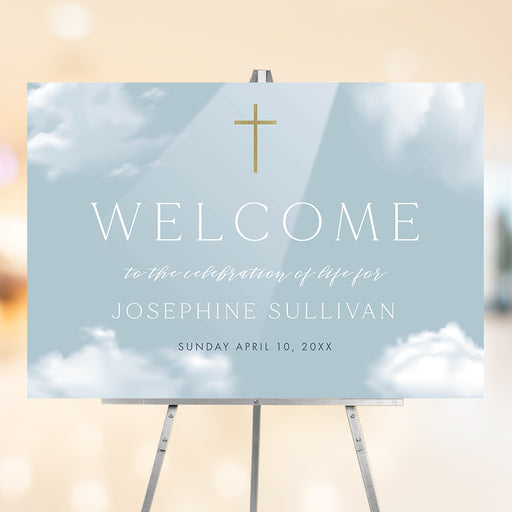 Celebration of life welcome sign with blue sky clouds and gold cross memorial design