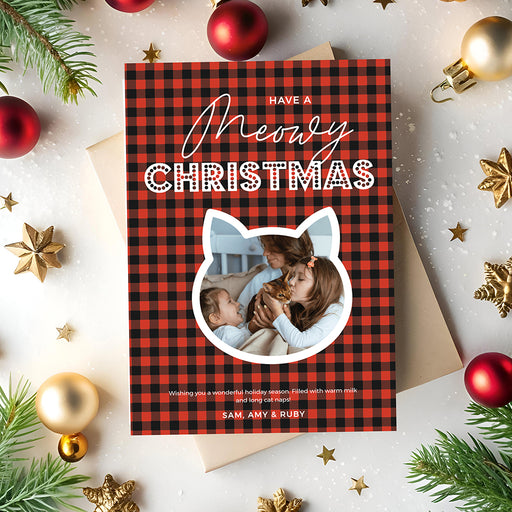 Meowy Christmas photo card template with red and black buffalo plaid and a cat-shaped frame around a pet photo.