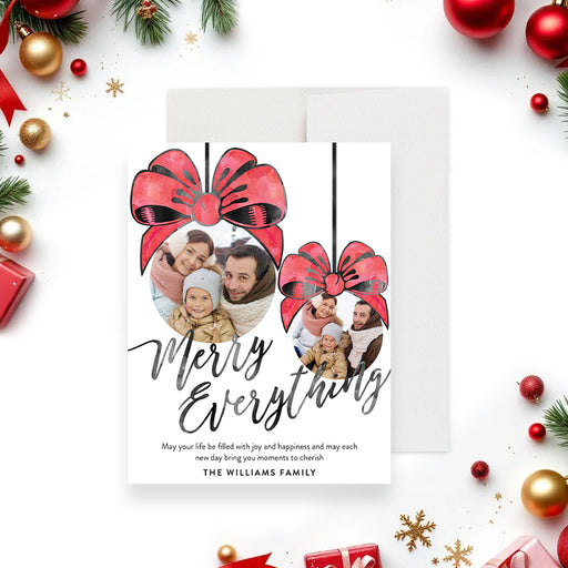 merry everything holiday greeting card with family photos inside festive ornament designs and red bow accents-front