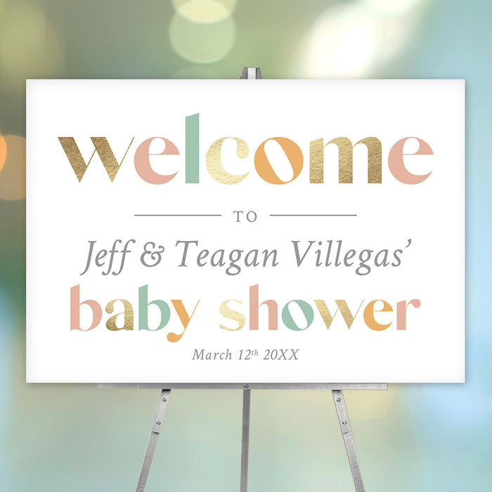 Customizable baby shower welcome sign featuring pastel and gold typography, adaptable with parents’ names and date, ideal for gender-neutral celebrations.