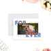 Modern photo save the date card featuring bold blue and orange typography with a couple’s engagement photo in a clean minimalist layout.-front