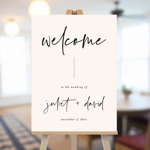 Minimalist beige wedding welcome sign with script typography and personalized couple names