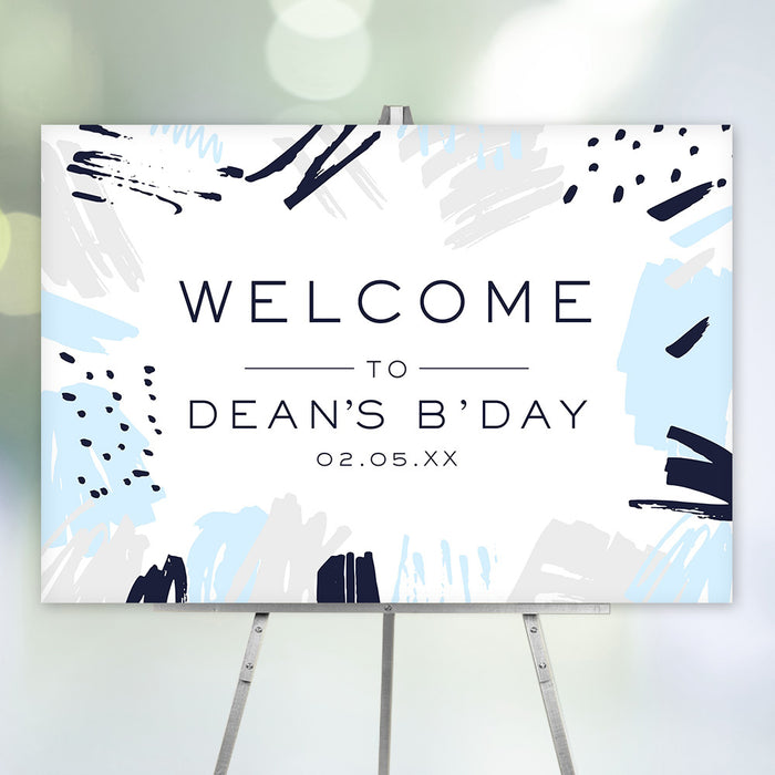 modern personalized birthday welcome sign with abstract blue and gray brushstroke artwork and minimalist typography on easel display.