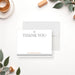 White Bar and Bat Mitzvah thank you note card with a small Star of David, personalized family name and gray lines below.