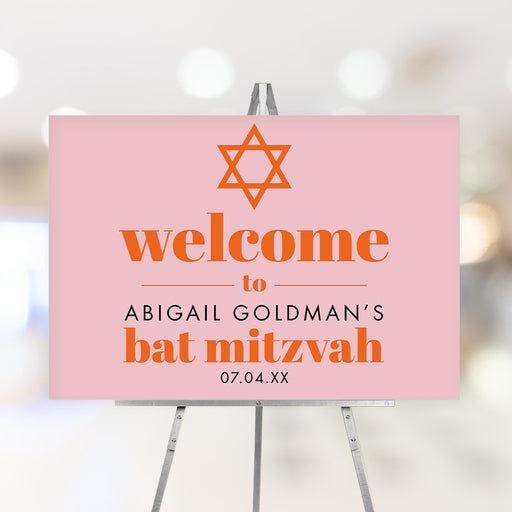 A personalized pink and orange Bat Mitzvah welcome sign featuring a Star of David, perfect for displaying at the entrance on her special day.