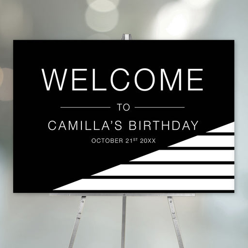 modern black and white birthday welcome sign with bold minimalist lettering and geometric stripe design for an adult birthday party