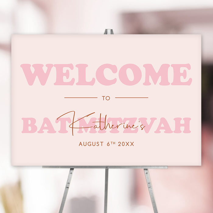Blush pink Bat Mitzvah welcome sign, displayed on an easel for a girl’s milestone celebration.