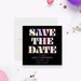 Surprise birthday save the date card with bold colorful lettering on a black background-front