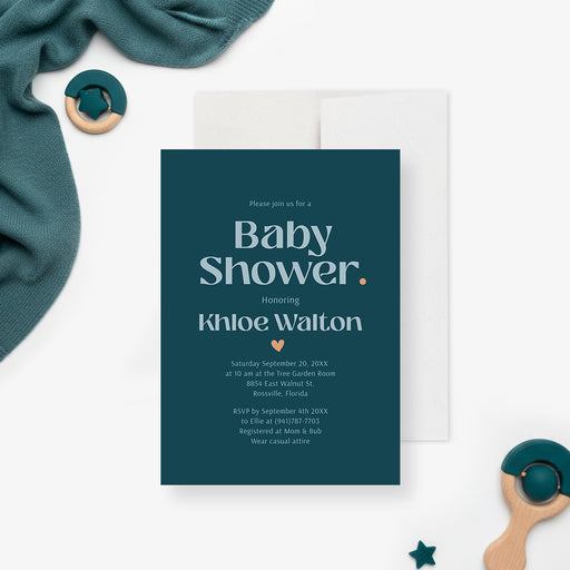 Modern teal baby shower invitation with pale blue lettering, peach dot and heart accents, and personalized event details-front