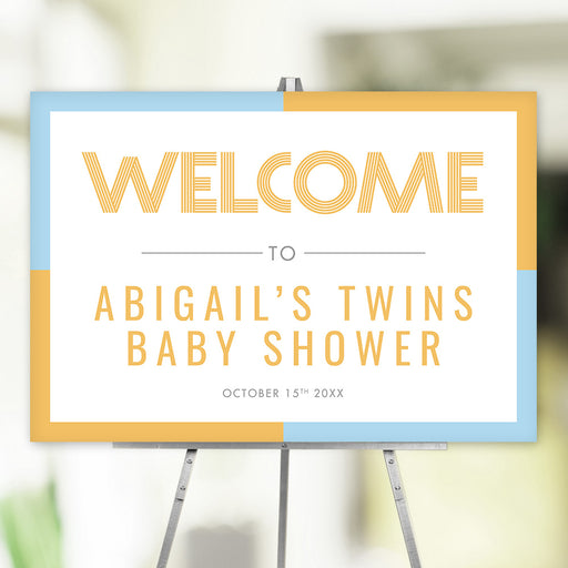 Custom baby shower welcome sign with blue and yellow border, personalized decor for boys and girls.