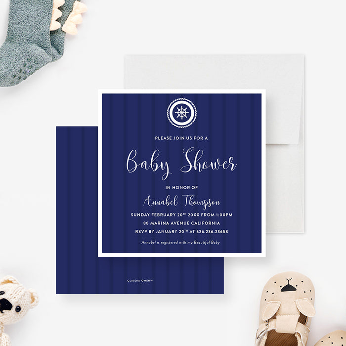 nautical baby shower invitation with navy blue background, ship wheel emblem, and elegant white lettering-front-back