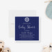 nautical baby shower invitation with navy blue background, ship wheel emblem, and elegant white lettering-front