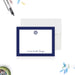 personalized nautical baby shower thank you card with navy blue border, ship wheel emblem, and custom name-front