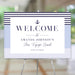 nautical bon voyage welcome sign with navy stripe border, anchor detail, and soft blue accents for a farewell lunch or going away party