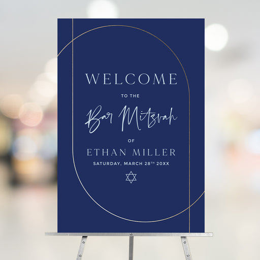 Navy and gold Bar Mitzvah welcome sign featuring a Star of David and an arch frame displayed at the event entrance.