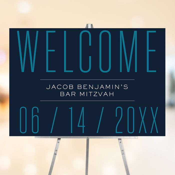 Modern Bar Mitzvah welcome sign with navy background and teal typography displayed on easel for Jewish event entrance décor