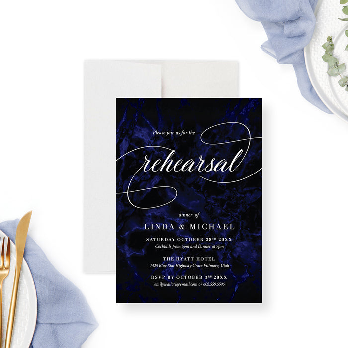 Modern rehearsal dinner invitation with a dark navy blue background and elegant typography-front