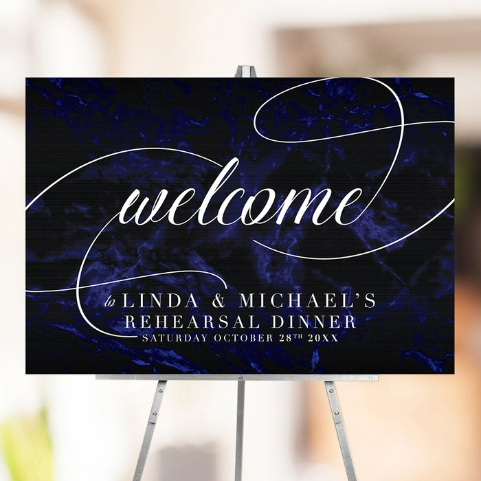 Navy blue rehearsal dinner welcome sign with modern calligraphy typography