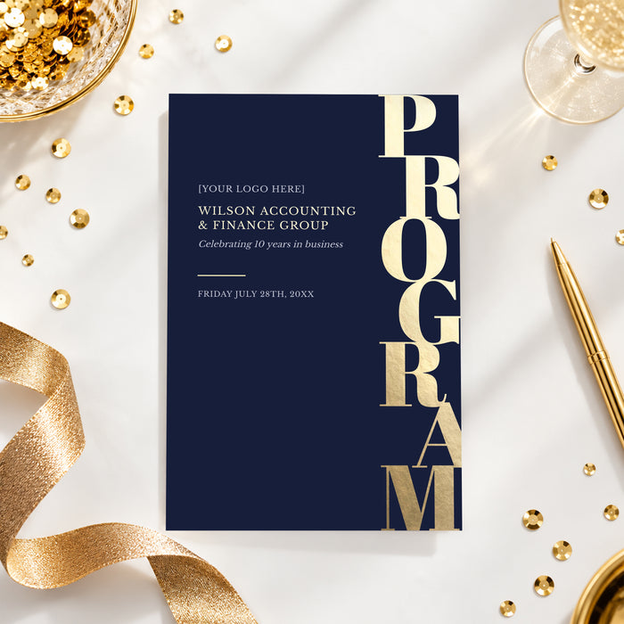 Navy blue event program cover with oversized vertical gold Program lettering, styled with gold ribbon and a pen.
