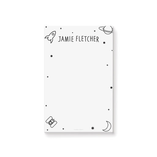 Personalized space-themed kids notepad featuring rockets, planets, and stars