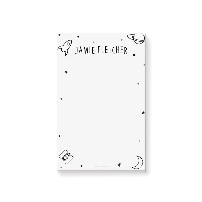 Personalized space-themed kids notepad featuring rockets, planets, and stars