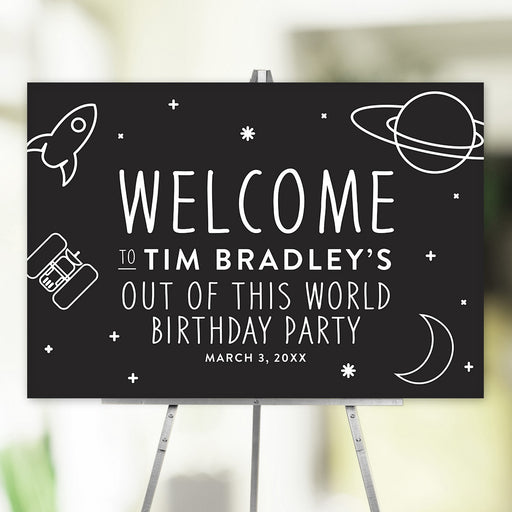 "Out of This World" birthday welcome sign with a rocket ship, planets, and stars design