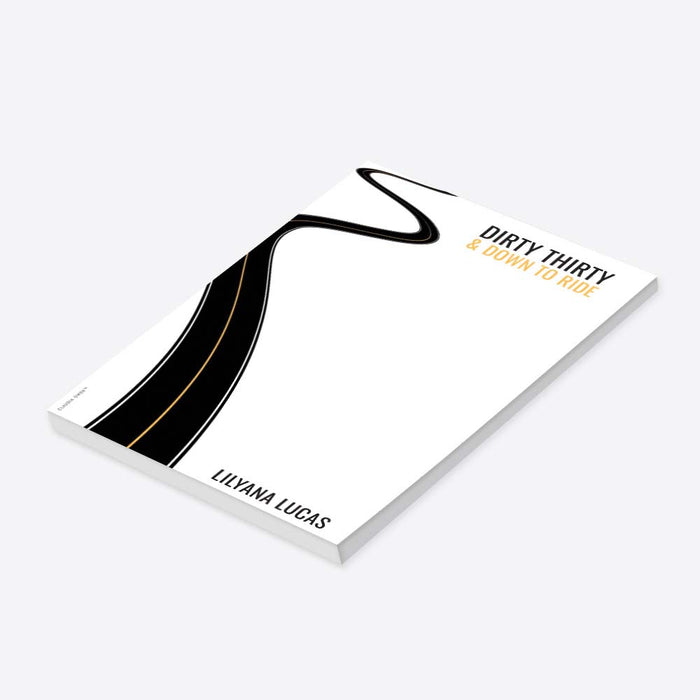 Personalized notepad featuring a winding road with the “Dirty Thirty and Down to Ride” design-side