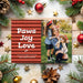 red striped holiday card reading paws joy love and a photo section showing people outdoors with a dog