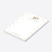 Personalized notepad with gold confetti dots, gold balloon 10th anniversary design, and custom names at the bottom-side