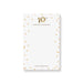 Personalized notepad with gold confetti dots, gold balloon 10th anniversary design, and custom names at the bottom