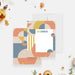 Personalized note card with orange, yellow and muted blue geometric shapes framing a white writing area.