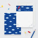 Airplane note cards showing a personalized red airplane front and a blue cloud pattern on the back.