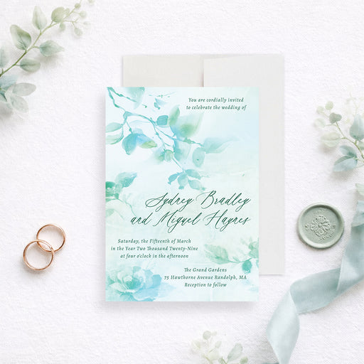 Personalized aqua watercolor greenery wedding invitation with leafy botanical design, custom couple’s names, wedding date and venue-front