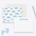 Personalized baby note cards with blue footprints between the first and last name on white and a blue cloud pattern on the back.