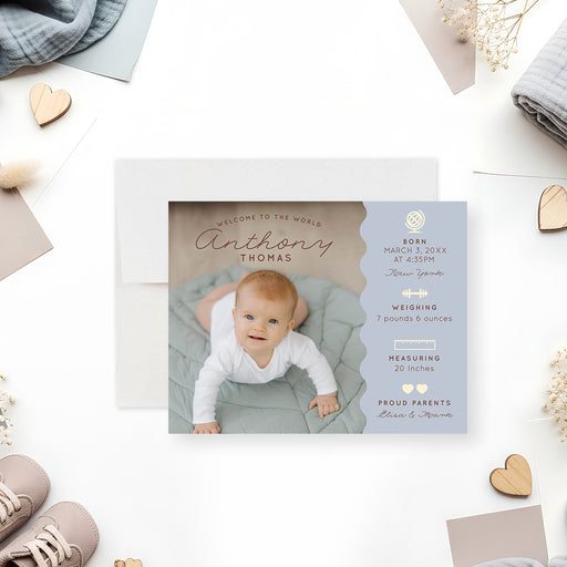 Personalized photo birth announcement card with soft blue wavy detail and baby birth stats-front